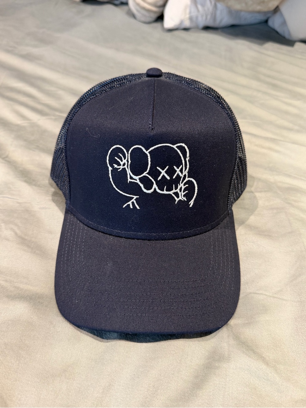 KAWS Navy Blue Trucker Hat